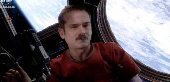 Commander Hadfield does triple cool: First music video from space!